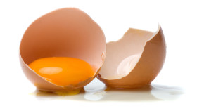 Chicken egg yolk isolated on white background